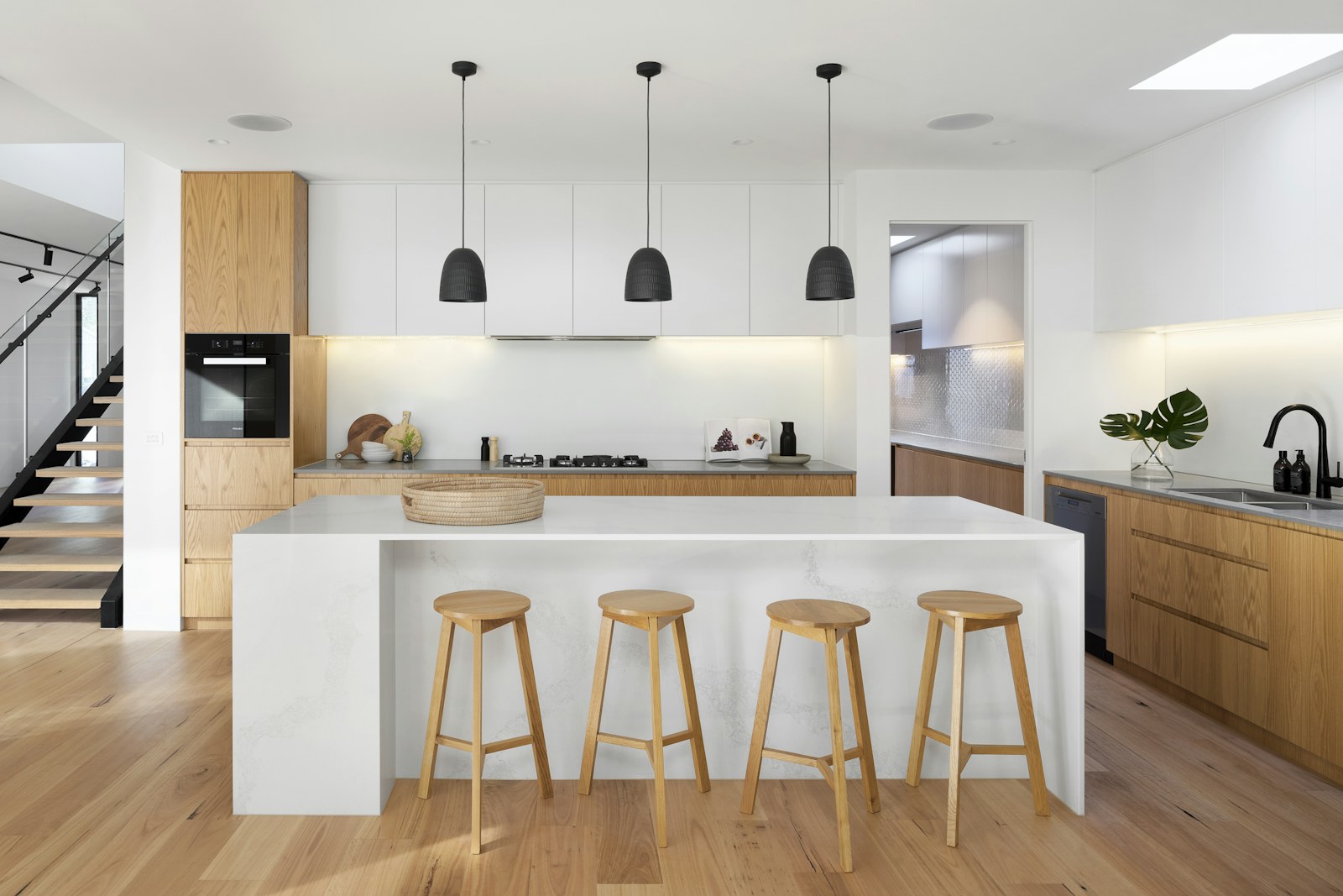 A bright, settled kitchen in a South Bay home after a move